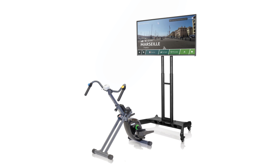 Ein Ergonometer für den Innenbereich, das an einen Flachbildschirm anschlossen ist.