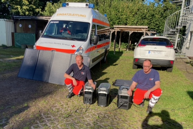 Personen mit Solargeneratoren