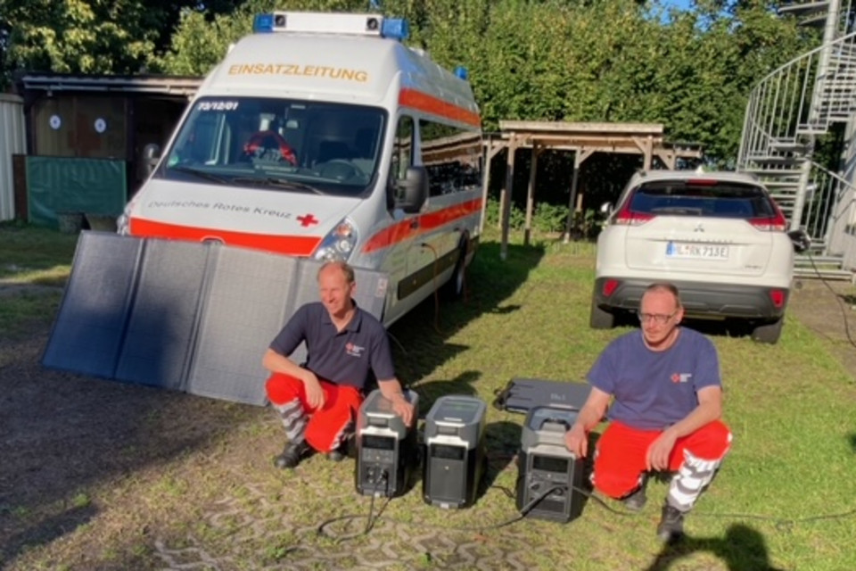 Personen mit Solargeneratoren